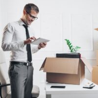 businessman-moving-into-a-new-office-picture-id1156675301 businessman-moving-into-a-new-office-picture-id1156675301